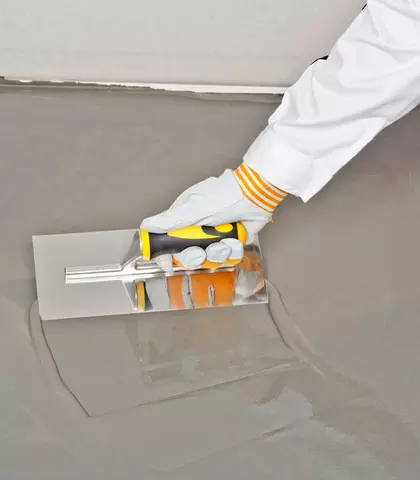 Floor tiling with adhesive